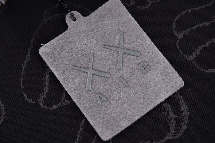 kaws x air jordan 4 grey 930155-003